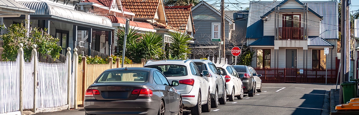 Cars parked on a inner-city suburban street