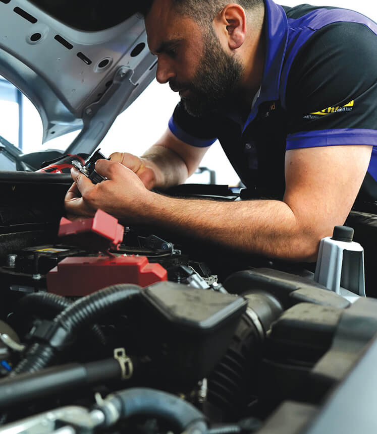Battery World expert conducting battery health check on vehicle