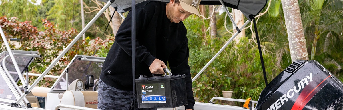 Mechanic completing maintenance on jetski
