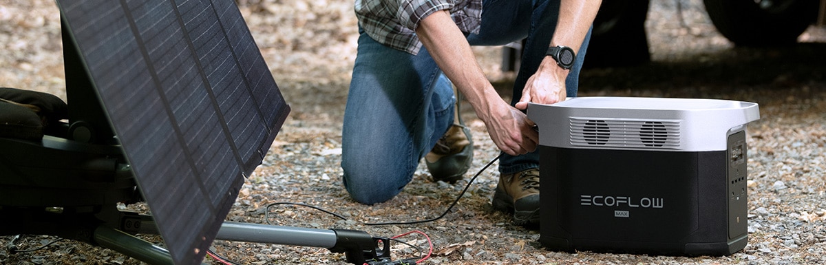 Man connecting solar panel to Ecoflow battery system