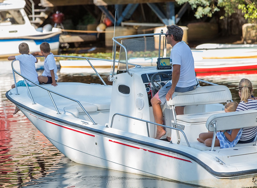 Family in a boat on the water