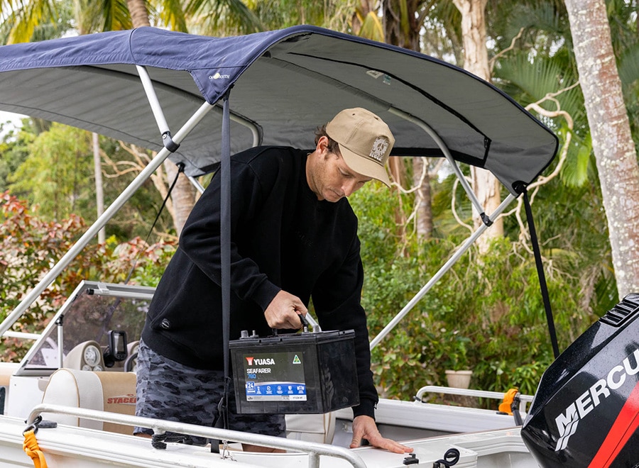 Mechanic completing jet ski maintenance