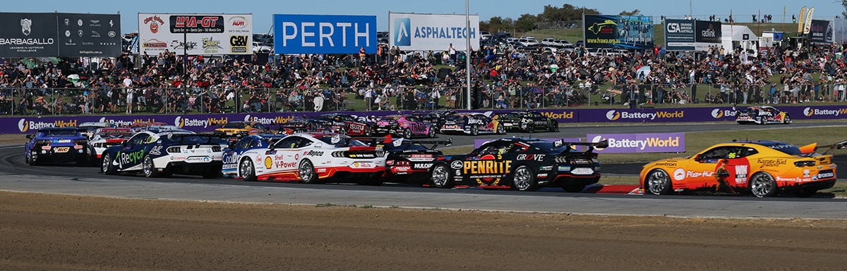 Supercars going around the track in perth