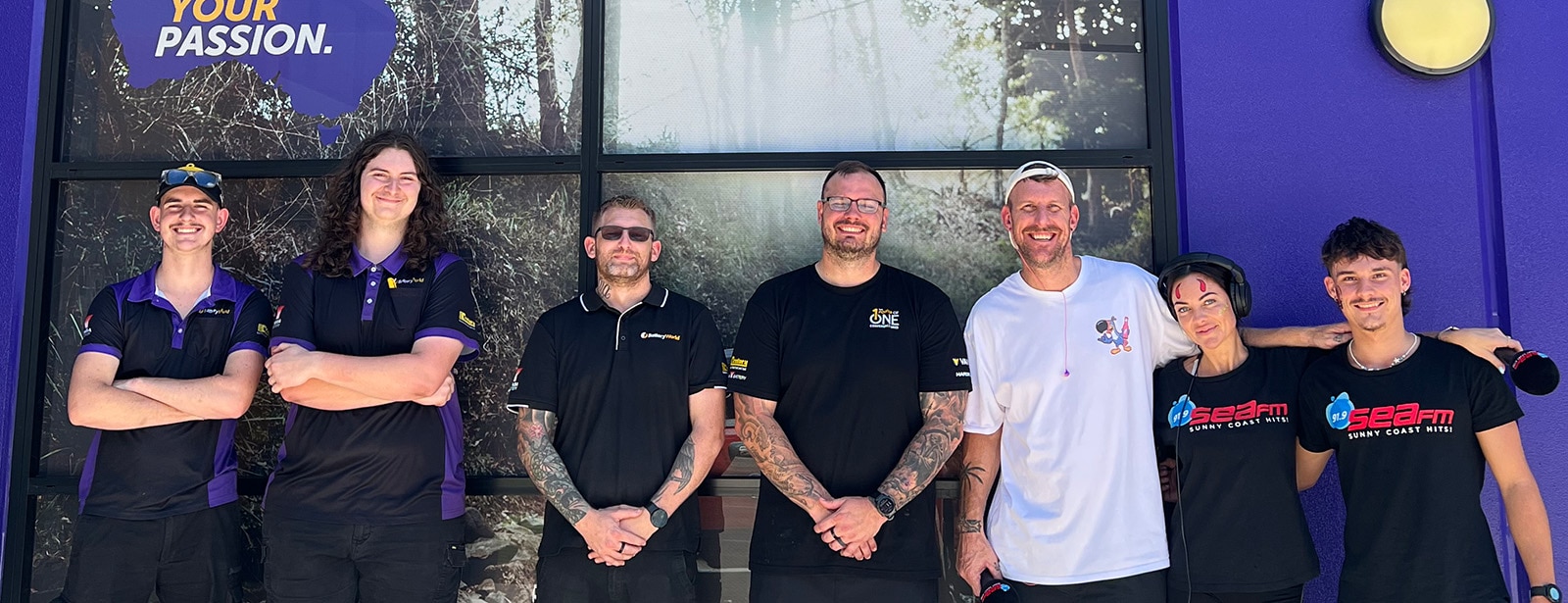 Photo of the Battery World Caloundra team and sea.fm radio presenters